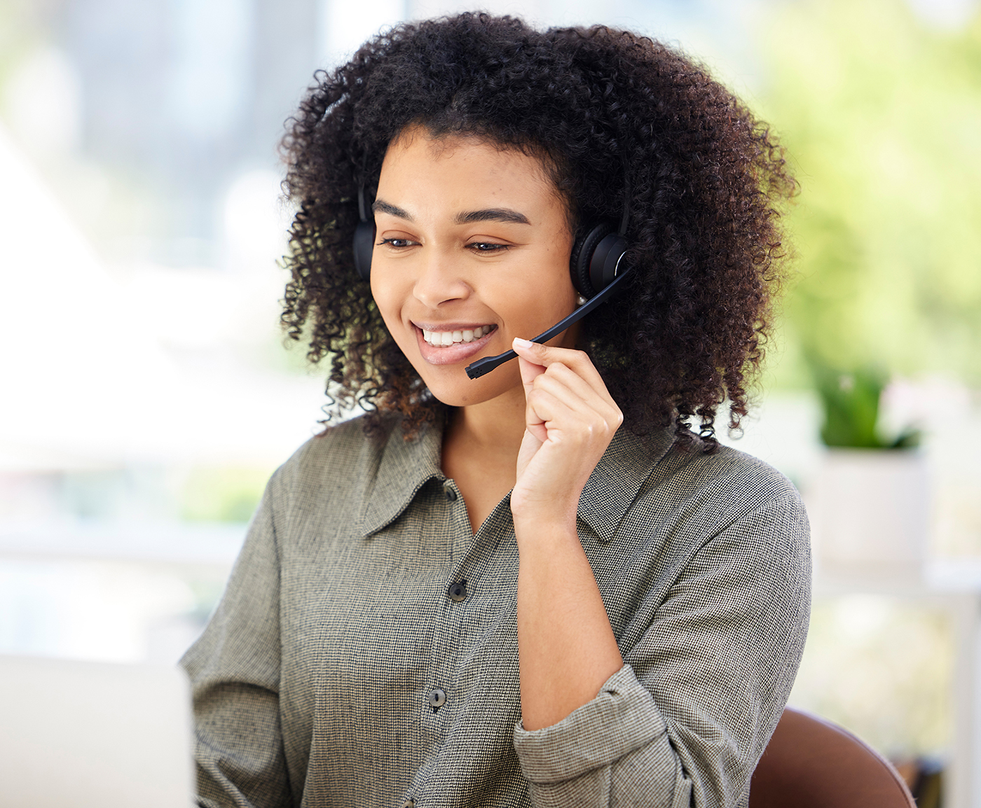 Woman speaking with a headset