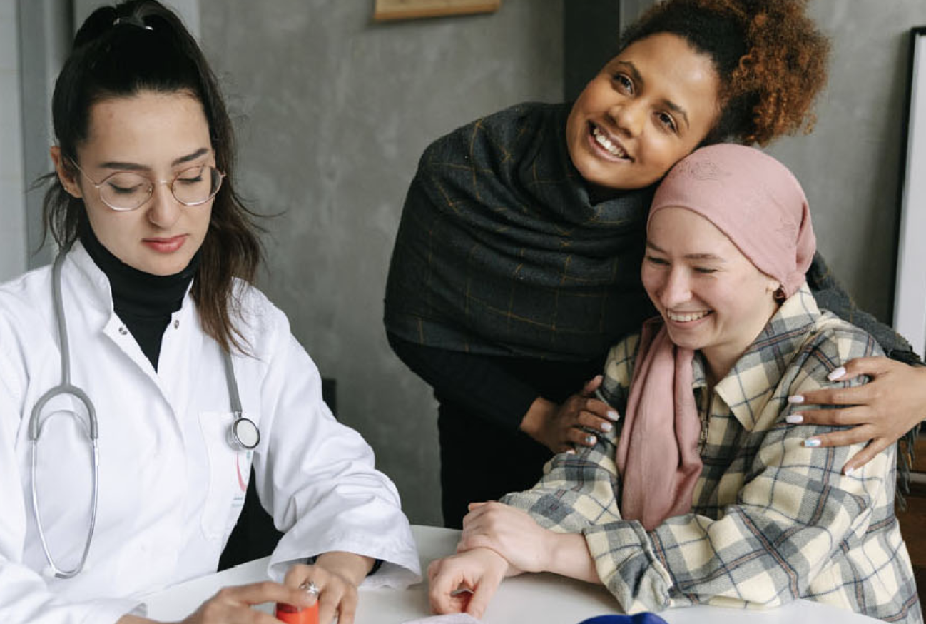 Patient with caregiver and doctor