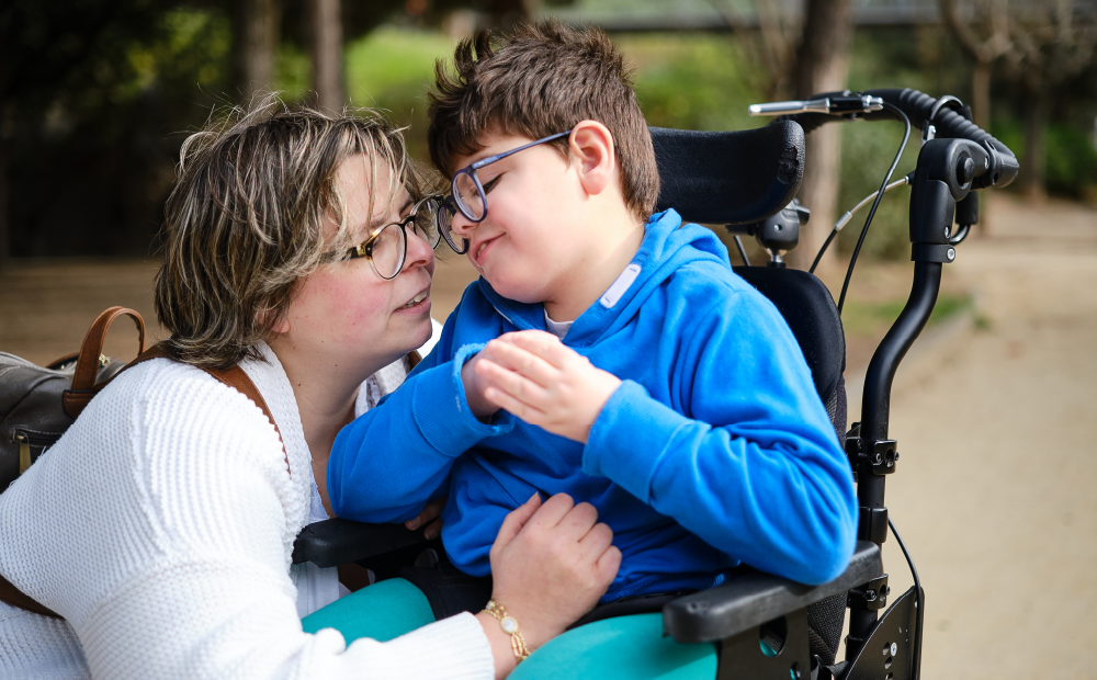 disabled-boy-in-a-wheelchair-enjoying-the-day-outdoors