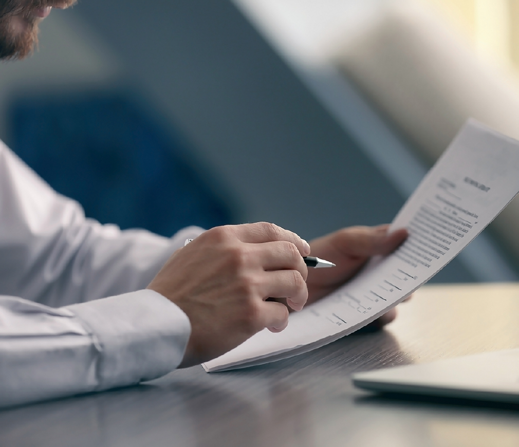 Man reviewing documents in office