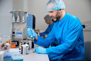Researcher investigating in a lab