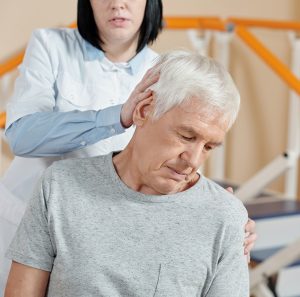 Neck massage by a physical therapist